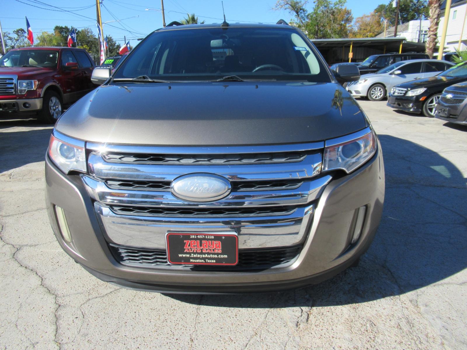 2012 Brown /Black Ford Edge SEL FWD (2FMDK3J90CB) with an 2.0L L4 DOHC 16V engine, Automatic transmission, located at 1511 North Shepherd Dr., Houston, TX, 77008, (281) 657-1221, 29.798361, -95.412560 - 2012 FORD EDGE SEL VIN: 2FMDK3J90CBA87262 4 DOOR WAGON/SPORT UTILITY 2.0L I4 F DOHC 16V GASOLINE FRONT WHEEL DRIVE - Photo #13